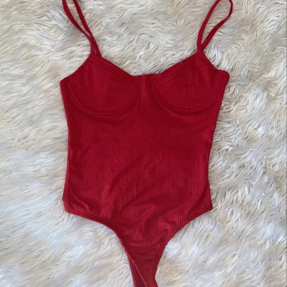 red rubbed onesie